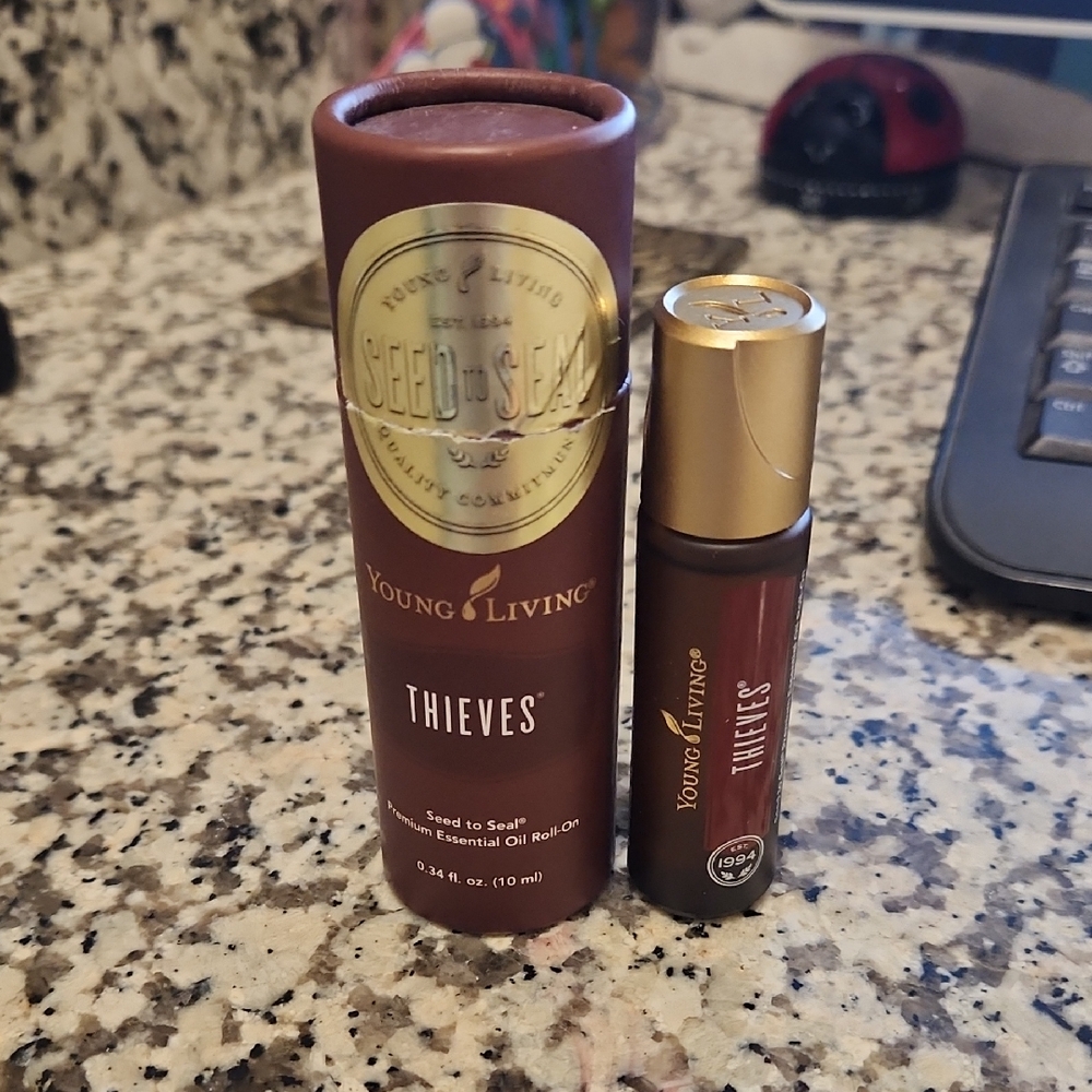 Young Living Thieves Essential Oil Roll-On - Rich Brown